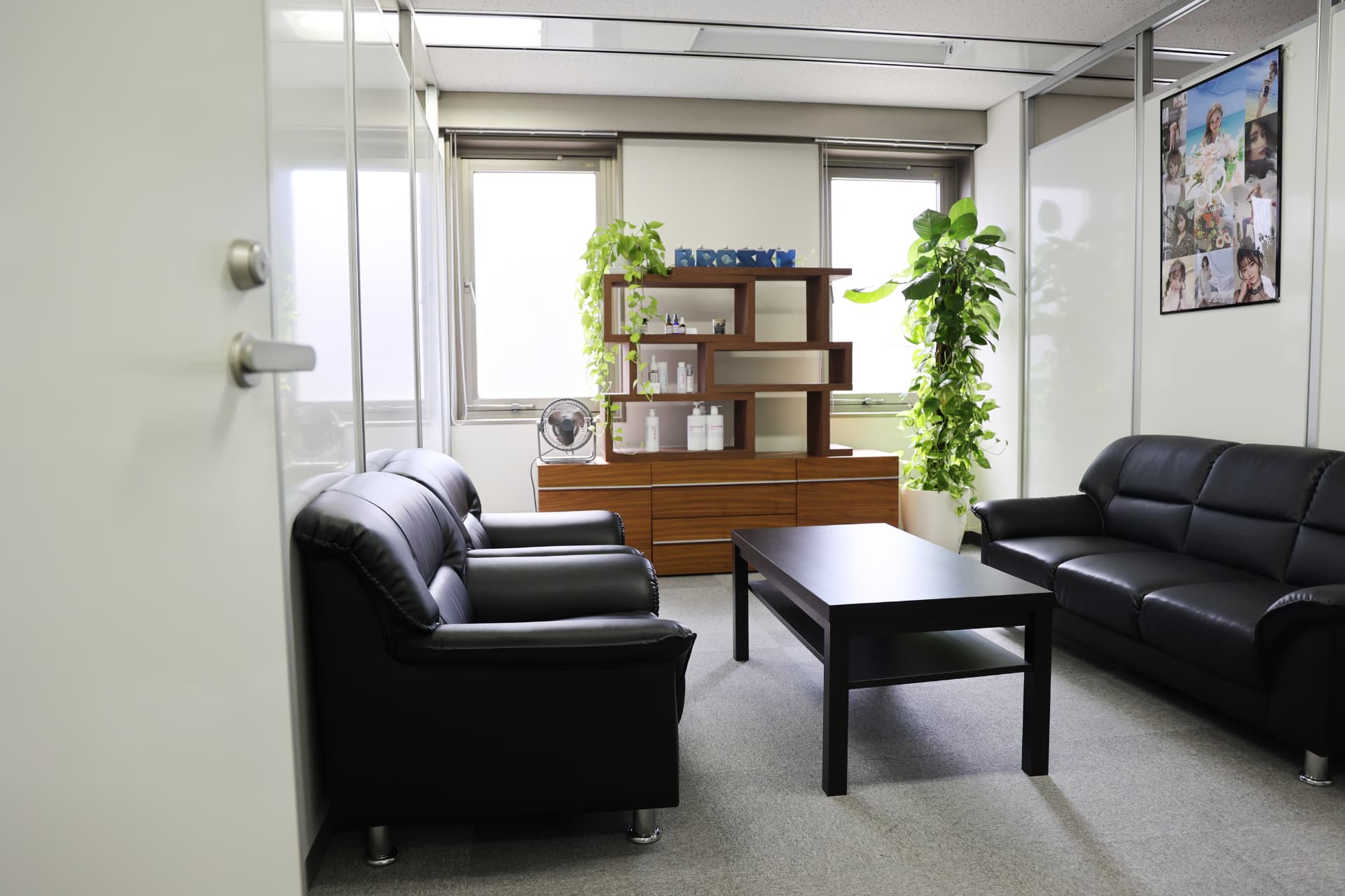 Reception lounge at the Tokyo office, with the group's skincare products on display.