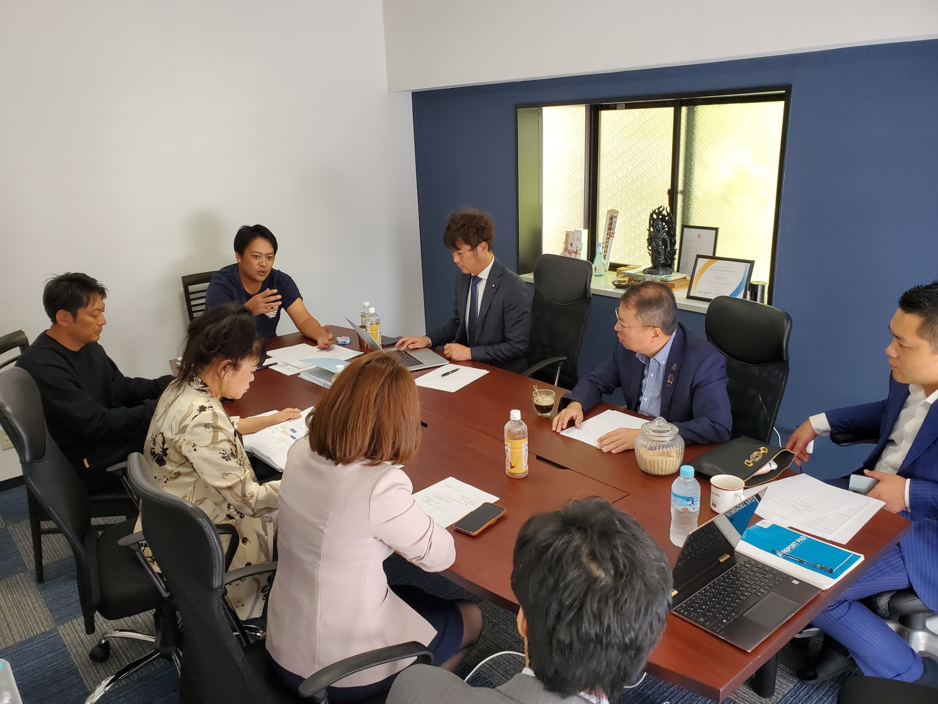 Cross-functional strategy meeting at the Tokyo office.