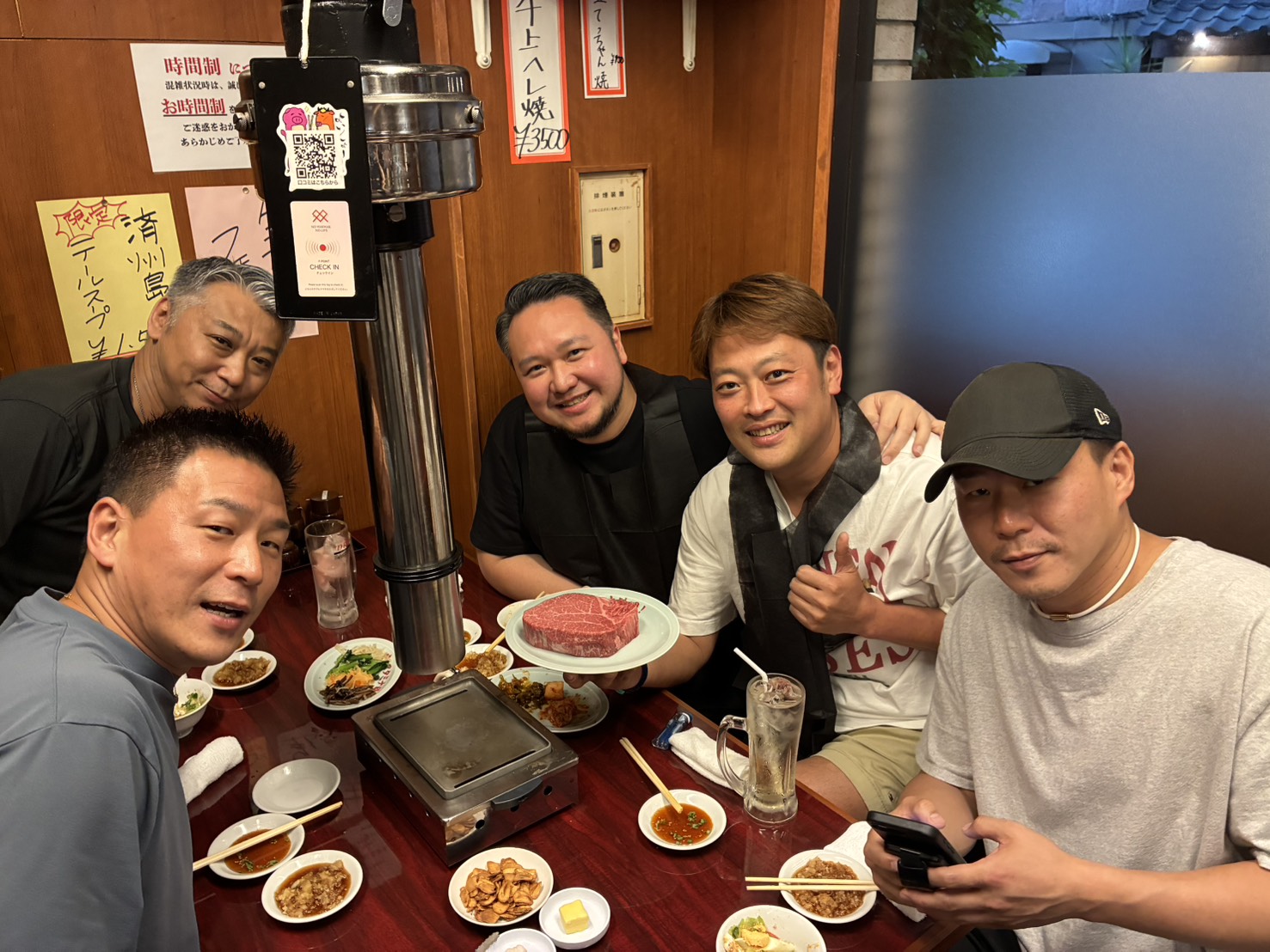 A team dinner in Tokyo — the informal conversations where much of the group's next work actually begins.