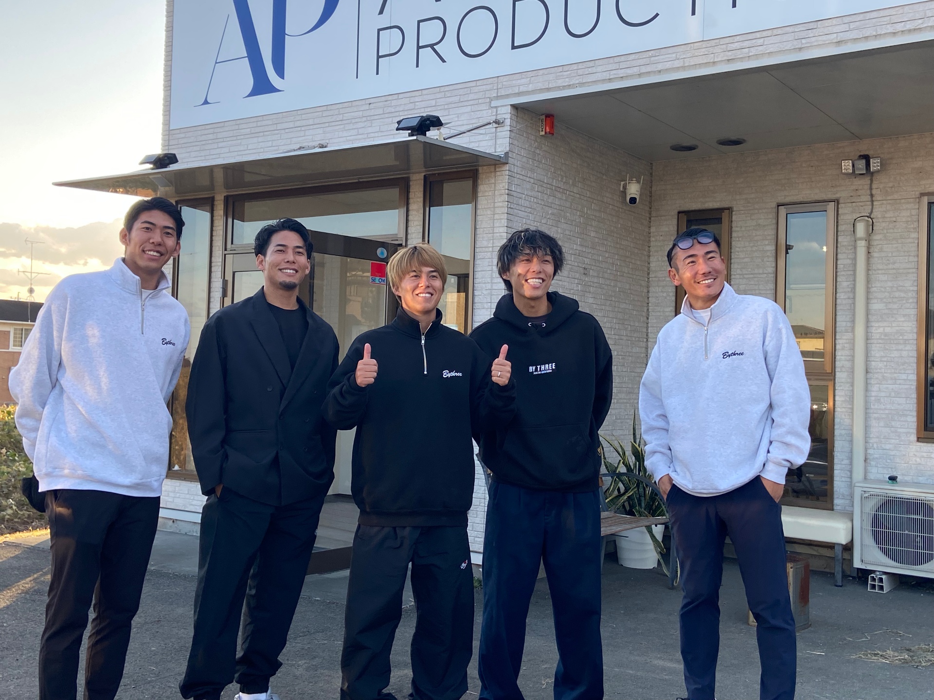 The team in front of Artisans Production Inc.