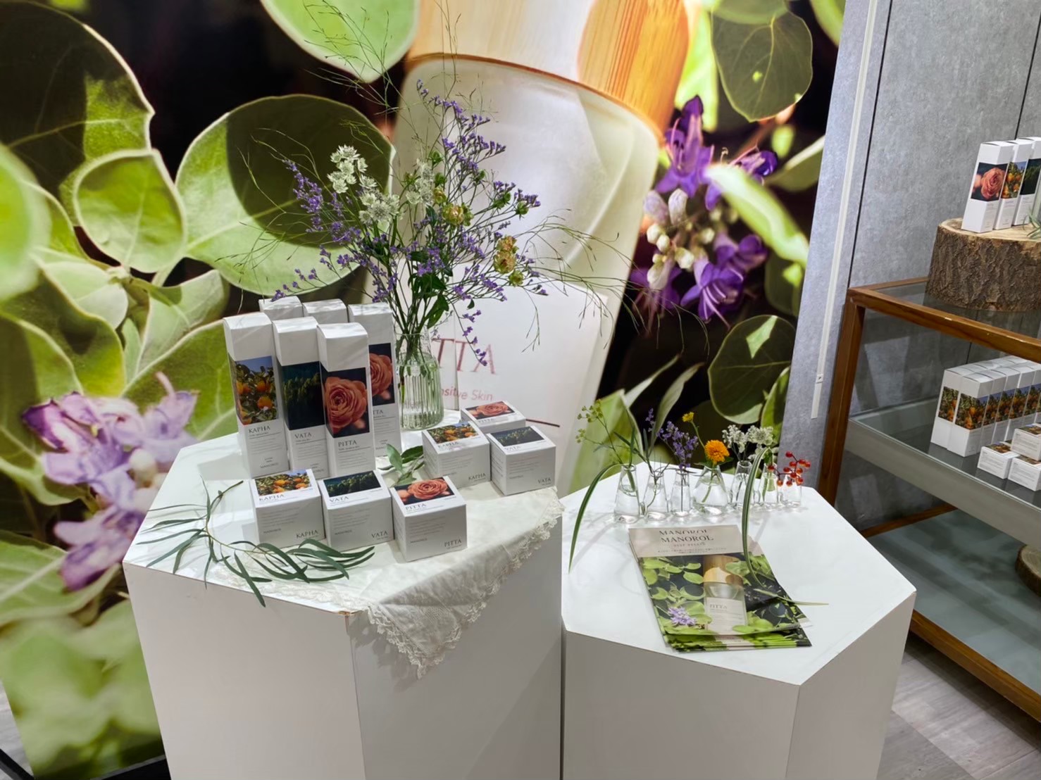 MANOROL product display at the Isetan pop-up — VATA, PITTA and KAPHA lines.
